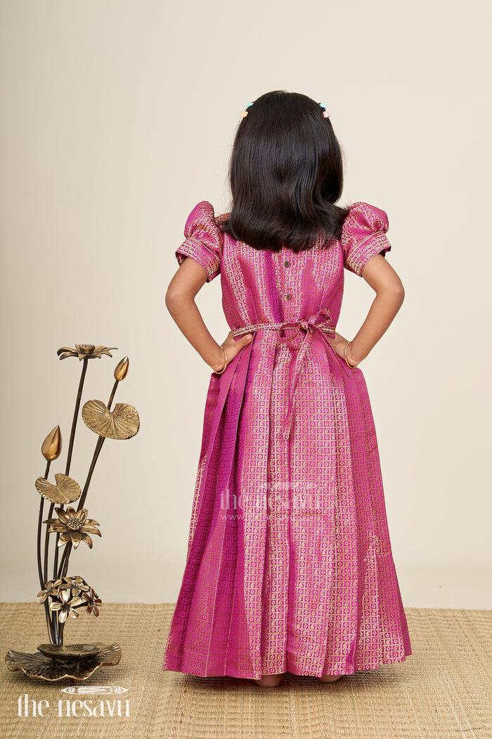 The Nesavu Girls Silk Gown Girls Long Anarkali Dress in Semi Banaras Silk with Royal Maroon Zari Weave and Grand Pleated Skirt Nesavu Nesavu Girls Long Anarkali Dress Maroon Semi Banaras Silk Gold Zari Flared Pleated Hem