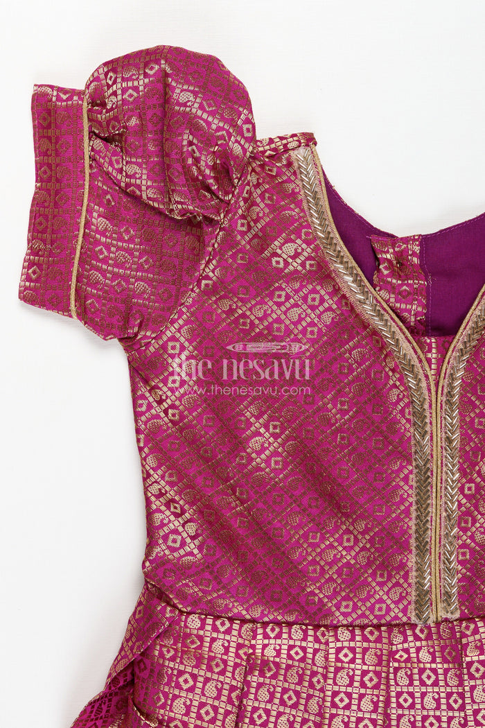 The Nesavu Girls Silk Gown Girls Long Anarkali Dress in Semi Banaras Silk with Royal Maroon Zari Weave and Grand Pleated Skirt Nesavu Nesavu Girls Long Anarkali Dress Maroon Semi Banaras Silk Gold Zari Flared Pleated Hem