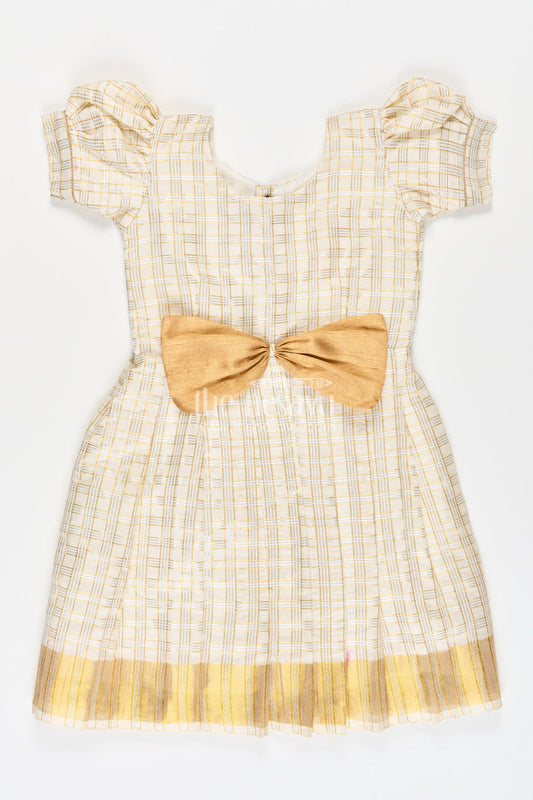 The Nesavu Silk Frock Girls Long Frock Simple in Beige Tissue Silk with Golden Pleats and Classic Bow Detail Nesavu 16 (1Y) / Cream SF1010D-16 Nesavu Girls Long Frock Simple Design Beige Silk Golden Pleats Bow Embellishment