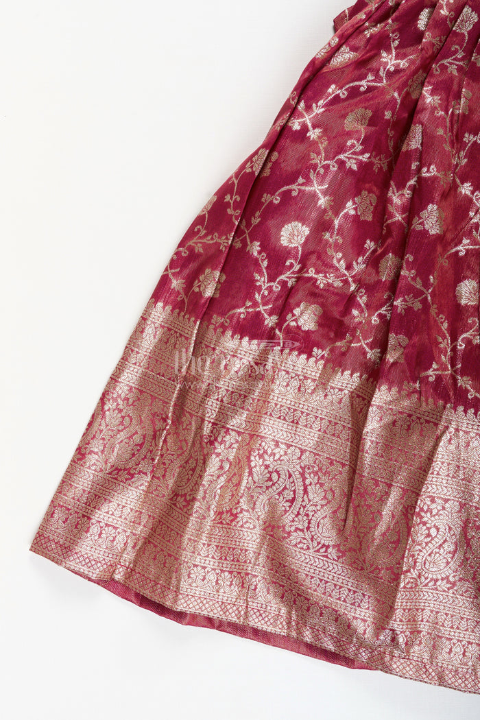 The Nesavu Girls Silk Gown Girls magenta Kora tissue silk Anarkali with big zari border Nesavu Nesavu girls magenta Kora tissue silk Anarkali with big zari border festive ethnic dress