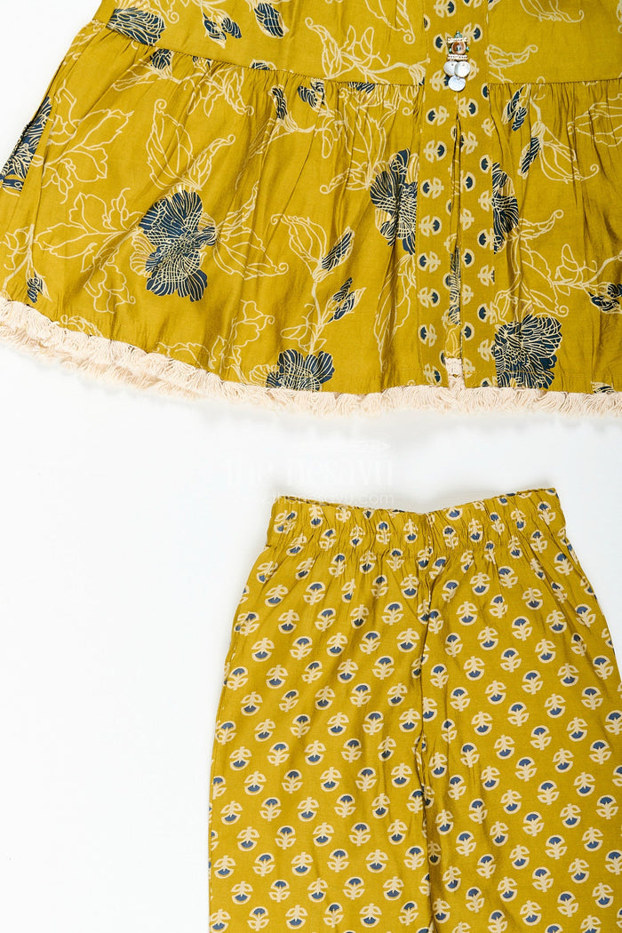 The Nesavu Girls Sharara / Plazo Set Girls mustard sharara set with black floral print for festive wear Nesavu Nesavu girls mustard sharara set with floral digital print and button-front kurti
