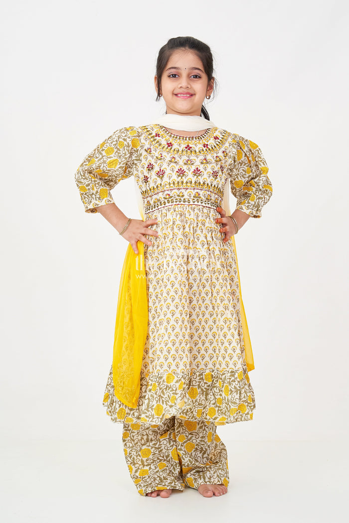 The Nesavu Girls Churidar Sets Girls Partywear Sharara Set in Yellow Floral Cotton with Mirror and Thread Embroidery Accents Nesavu Nesavu Girls Partywear Sharara Set with Mirror Embroidery and Yellow Floral Printed Cotton Co-Ord Look