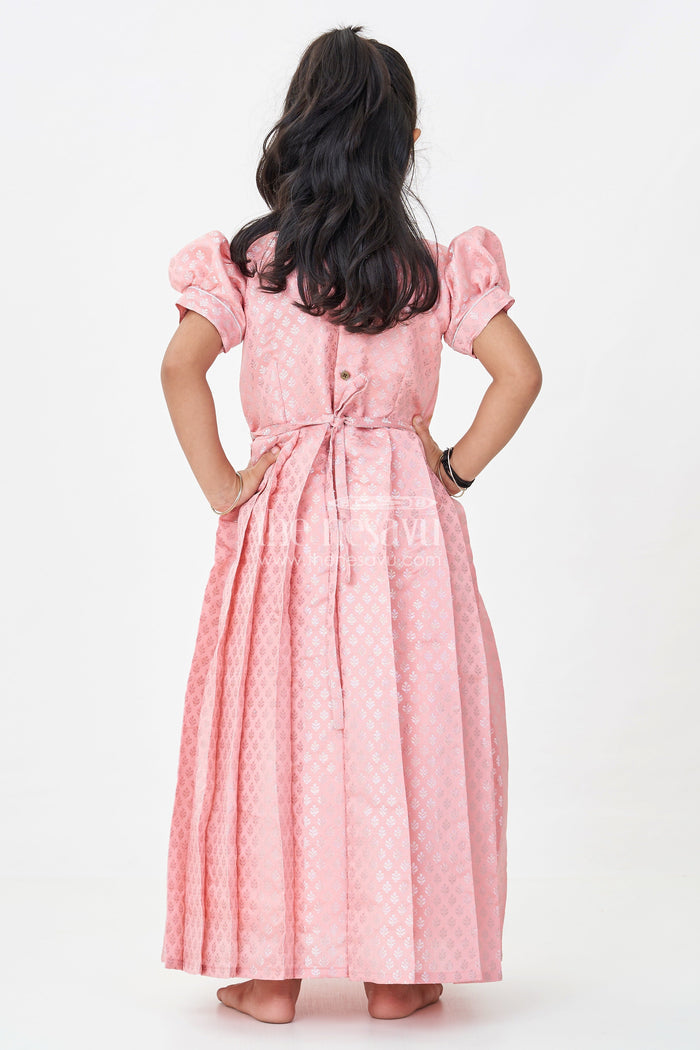 The Nesavu Girls Silk Gown Girls Semi Banaras Silk Pink Party Wear Gown with Intricate Woven Motifs and Classic Puff Sleeves Nesavu Girls Semi Banaras Silk Pink Party Wear Gown Floral Woven Design Puff Sleeves | The Nesavu