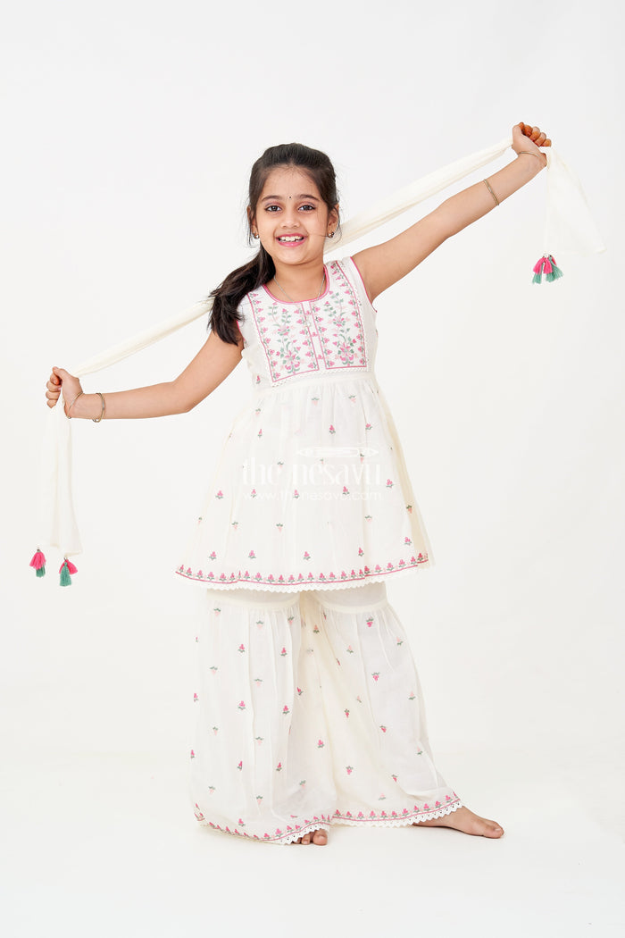The Nesavu Girls Sharara / Plazo Set Girls white sharara set with Floral Embroidered Cotton Kurti and Tassel Dupatta for Graceful Outings Nesavu 18 (2Y) / White GPS602A-18 Nesavu Girls white sharara set Floral Cotton Embroidery Tassel Dupatta Festive Wear