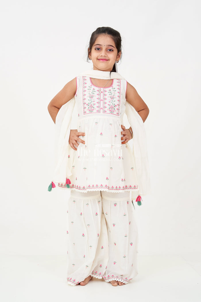 The Nesavu Girls Sharara / Plazo Set Girls white sharara set with Floral Embroidered Cotton Kurti and Tassel Dupatta for Graceful Outings Nesavu Nesavu Girls white sharara set Floral Cotton Embroidery Tassel Dupatta Festive Wear