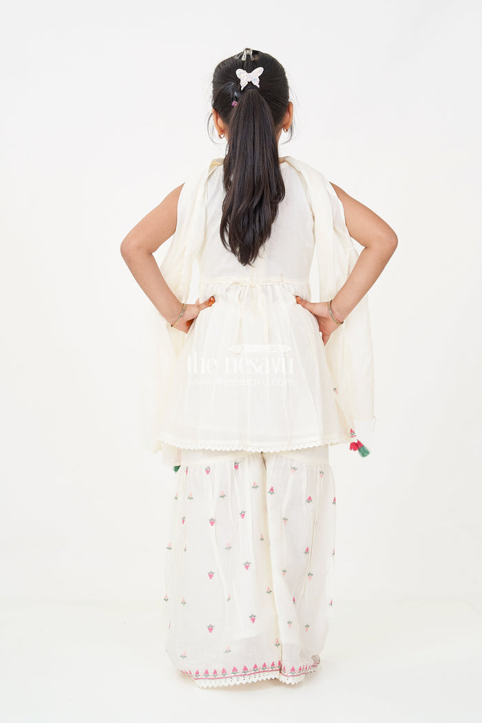 The Nesavu Girls Sharara / Plazo Set Girls white sharara set with Floral Embroidered Cotton Kurti and Tassel Dupatta for Graceful Outings Nesavu Nesavu Girls white sharara set Floral Cotton Embroidery Tassel Dupatta Festive Wear