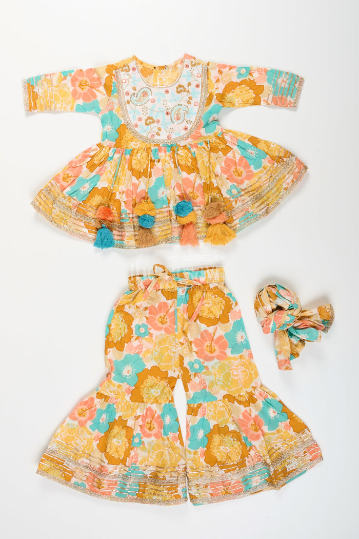 The Nesavu Girls yellow cotton sharara set with tassels and floral block print for ethnic days Nesavu Nesavu girls yellow cotton block print sharara set tassels  ethnic outfit school casual celebrations