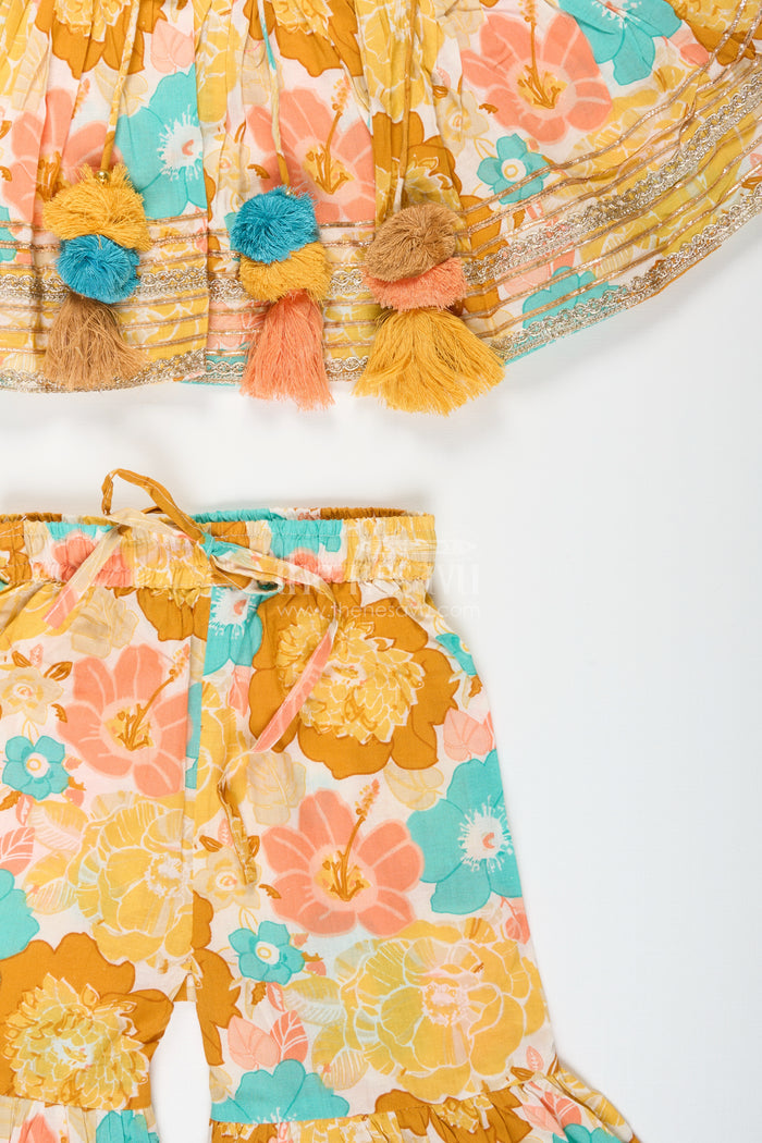 The Nesavu Girls Sharara / Plazo Set Girls Yellow Cotton Sharara Set with Tassels and Floral Block Print for Ethnic Days Nesavu Nesavu girls yellow cotton block print sharara set tassels  ethnic outfit school casual celebrations