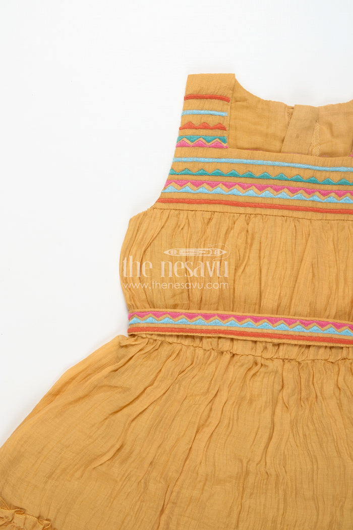 The Nesavu Girls Cotton Frock Girls Yellow Frocks Design with Popcorn Crush Cotton and Multicolor Embroidered Details Nesavu Nesavu Yellow Frocks Design Girls Thread Embroidery Soft Popcorn Crush Cotton Finish