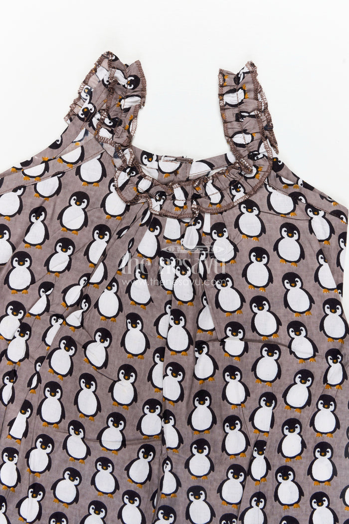 The Nesavu Girls Cotton Frock Kids Casual Cotton Printed Frock for Girls with Brown Penguin Block Print and Frilled Shoulders Nesavu Nesavu Brown Hand Block Kids Casual Cotton Printed Frock Penguin Motifs Ruffled Design