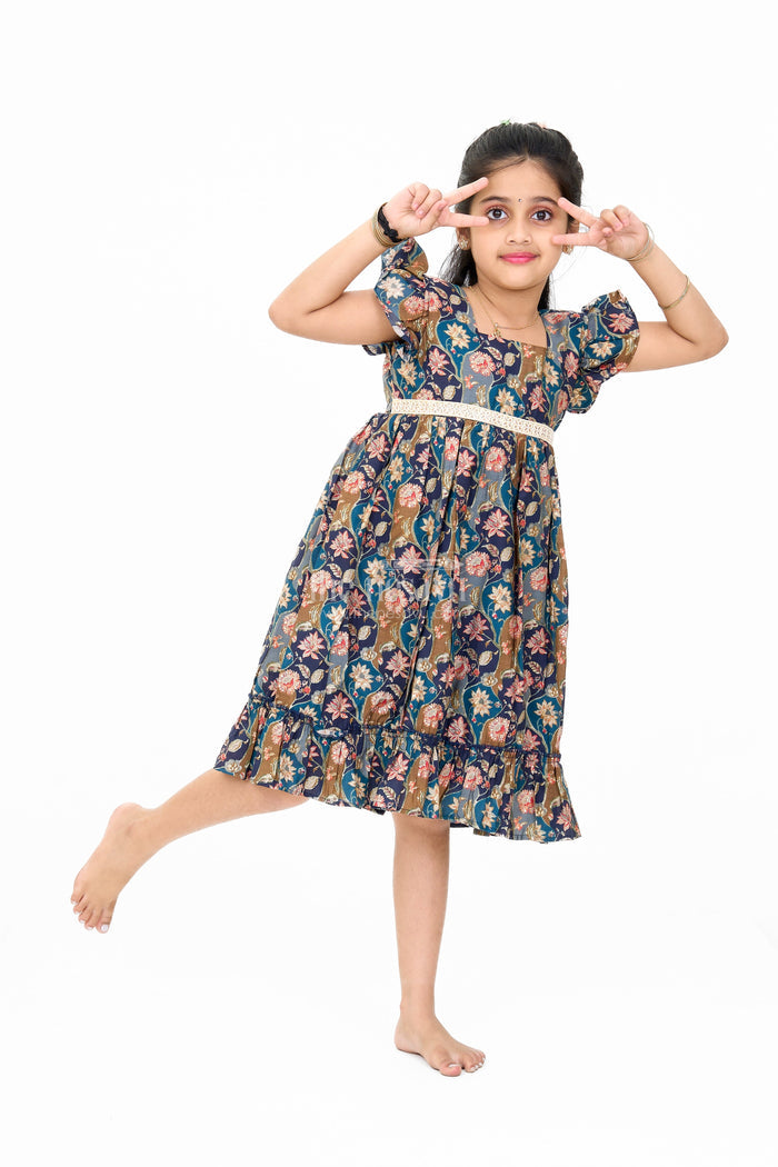 The Nesavu Girls Cotton Frock Long Party Wear Gown for Girls with Elegant Black Floral Print and Ruffle Details Nesavu Nesavu Long Party Wear Gown Girls Black Floral Print Ruffles