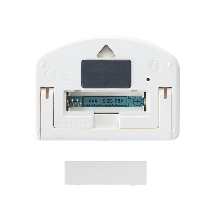 Back view of white timer with opened battery compartment and a foldable stand.