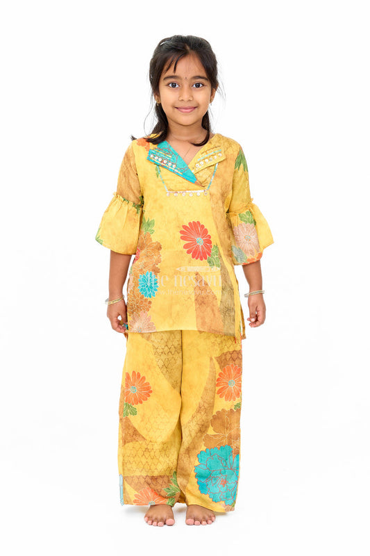 The Nesavu Girls Sharara / Plazo Set Mustard Mercerised Silk Cotton Girls Sharara Set with Bold Floral Print and Embellished Neckline Nesavu 24 (5Y) / Yellow GPS438A-24 Nesavu Mustard Mercerised Silk Cotton Sharara Set Girls Floral Print Sequined Top