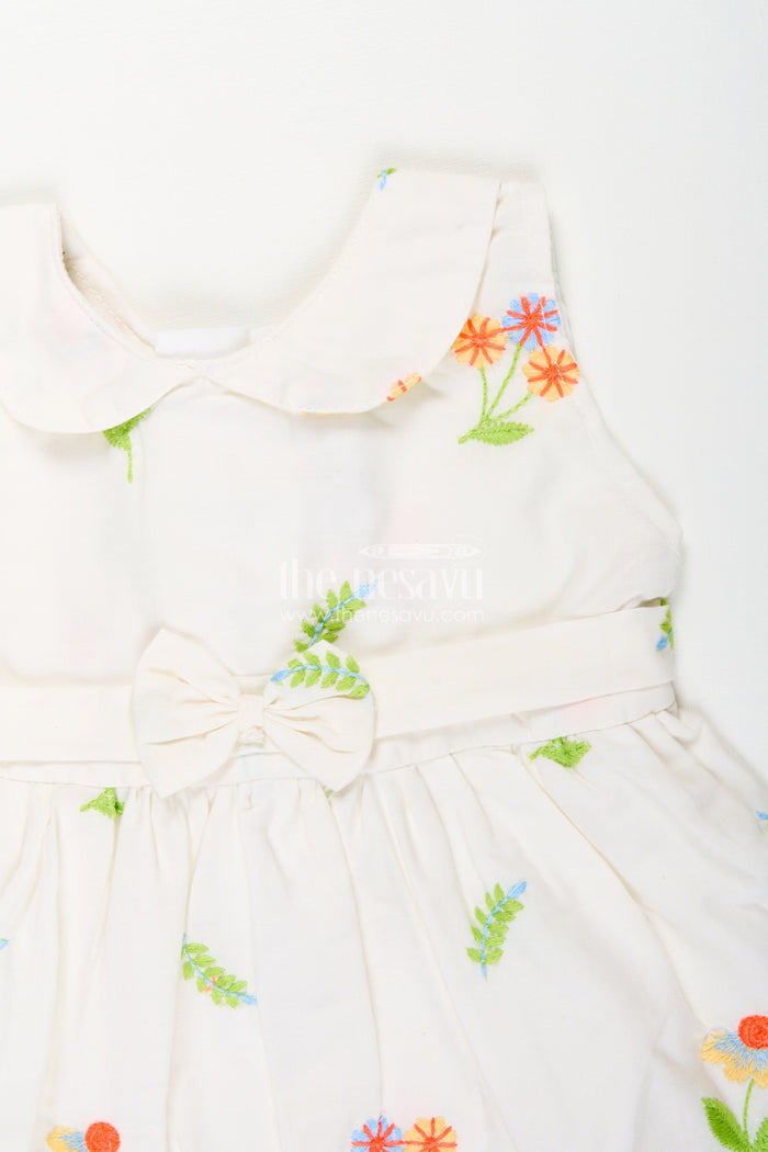 The Nesavu Baby Cotton Frocks Nesavu cotton baby girl frock with pastel floral embroidery and peter pan collar Nesavu Nesavu cotton baby girl frock with pastel floral embroidery and peter pan collar
