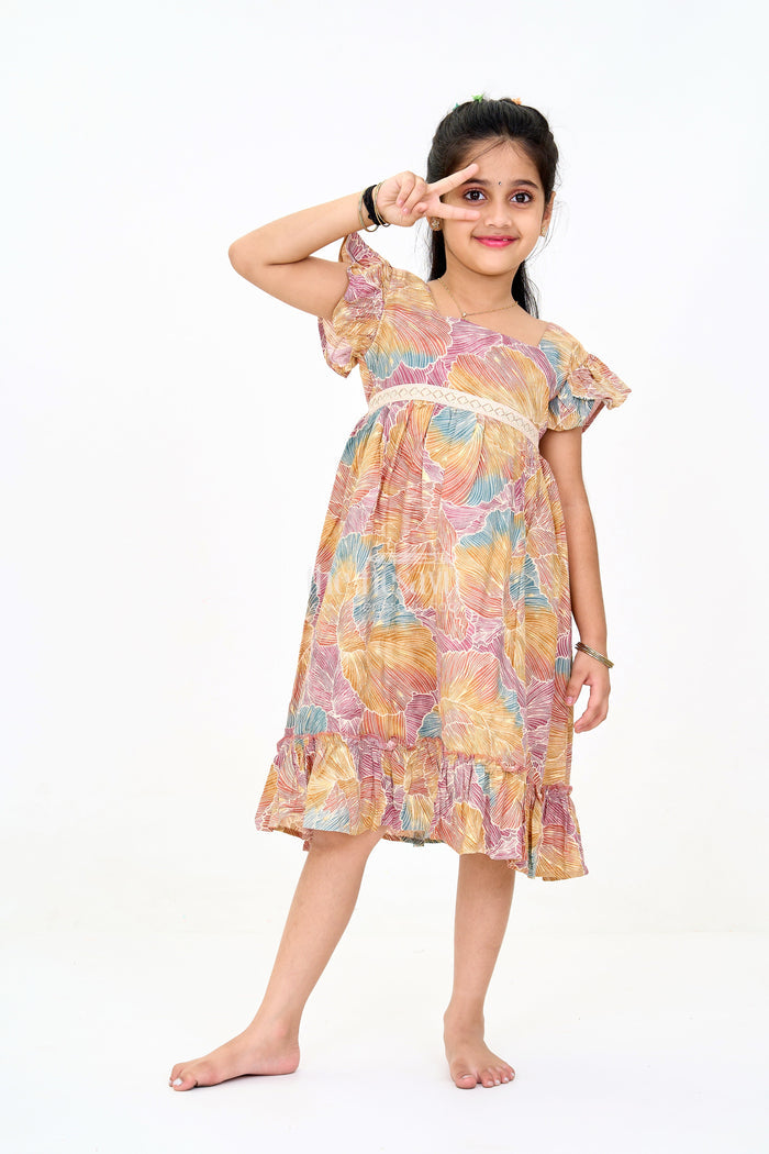 The Nesavu Girls Cotton Frock Organza Frock for Girls in Multicolor Leaf Pattern with Flared Design Nesavu Nesavu Multicolor Leaf Pattern Organza Frock Girls Ruffle Hem