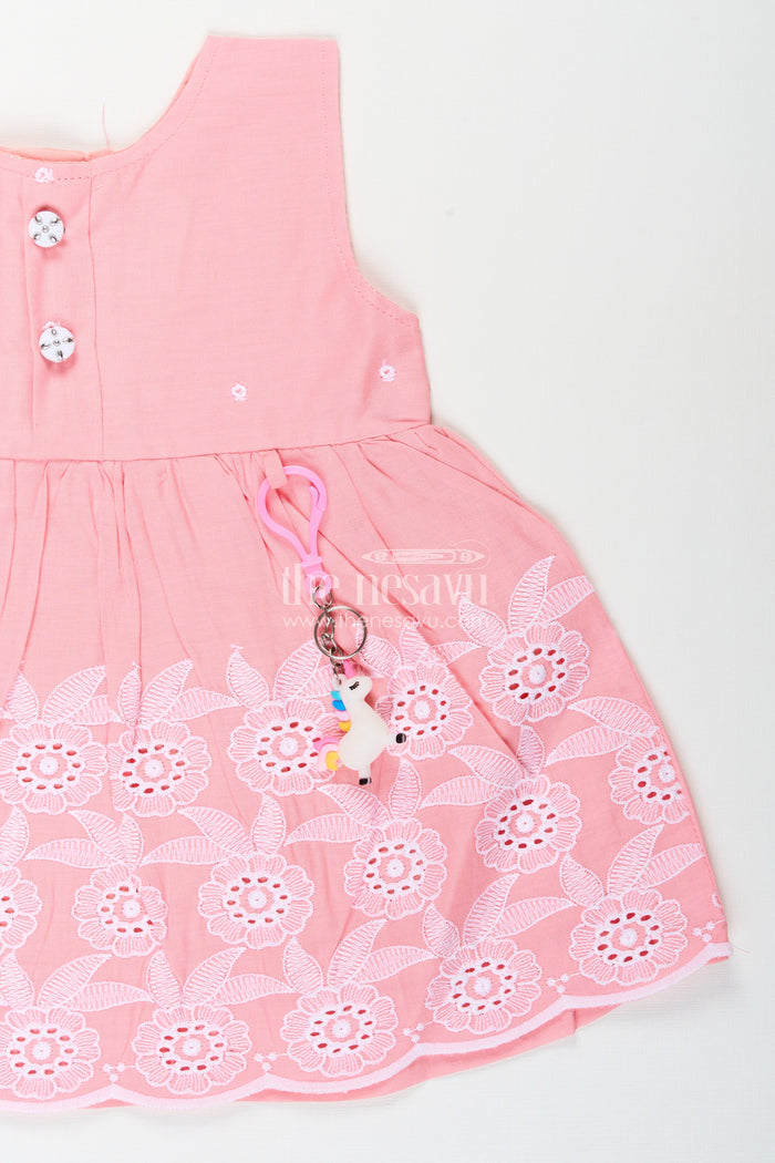 The Nesavu Baby Cotton Frocks Pink frock for baby girls with white floral embroidery Nesavu Nesavu pink sleeveless frock for baby girls with floral embroidery and scalloped hem