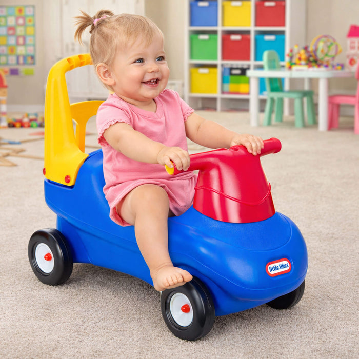 Child riding a colorful toy car in a playroom