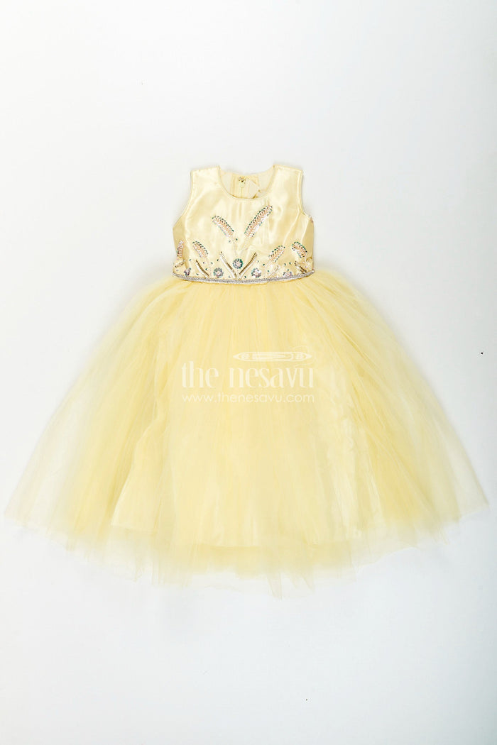 The Nesavu Girls Party Gown Satin and net party gown for girls with bead embroidery Nesavu Nesavu girls yellow party gown with satin bodice and embroidered net flare