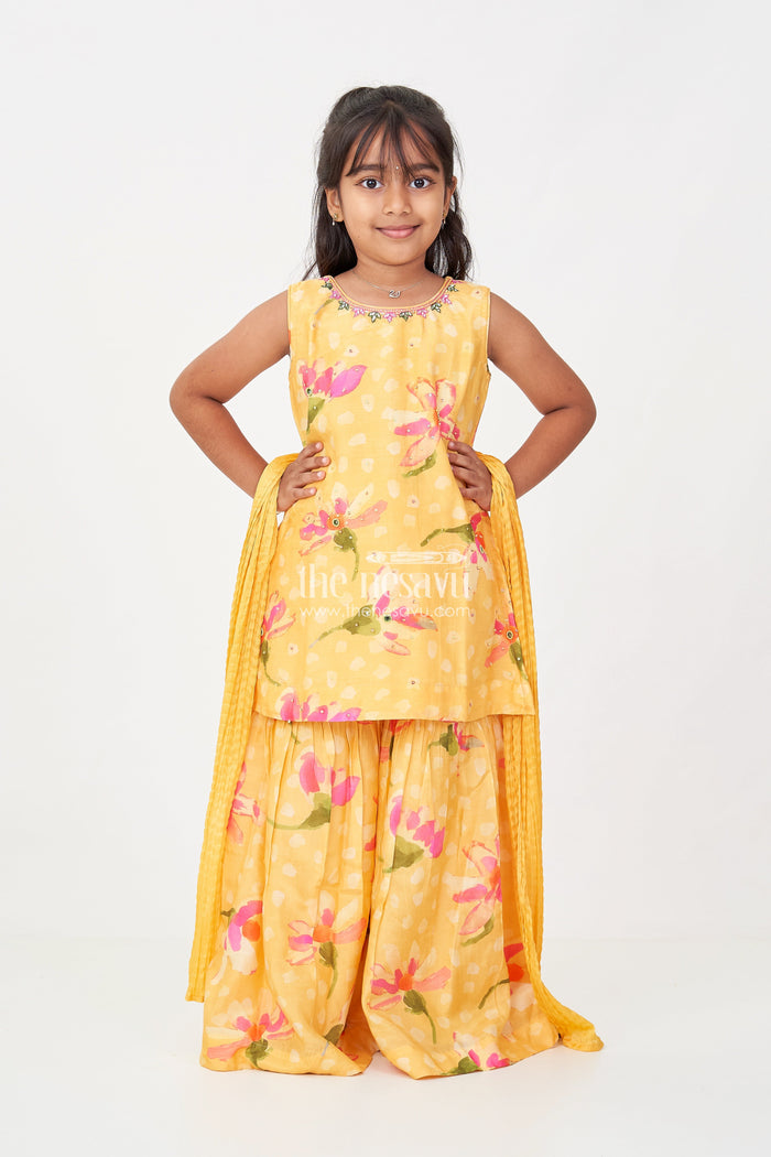 The Nesavu Girls Sharara / Plazo Set Sharara Outfits for Girls in Viscose Silk with Yellow Floral Print and Matching Dupatta Nesavu Nesavu Sharara Outfits for Girls in Yellow Floral Digital Print with Viscose Silk and Dupatta