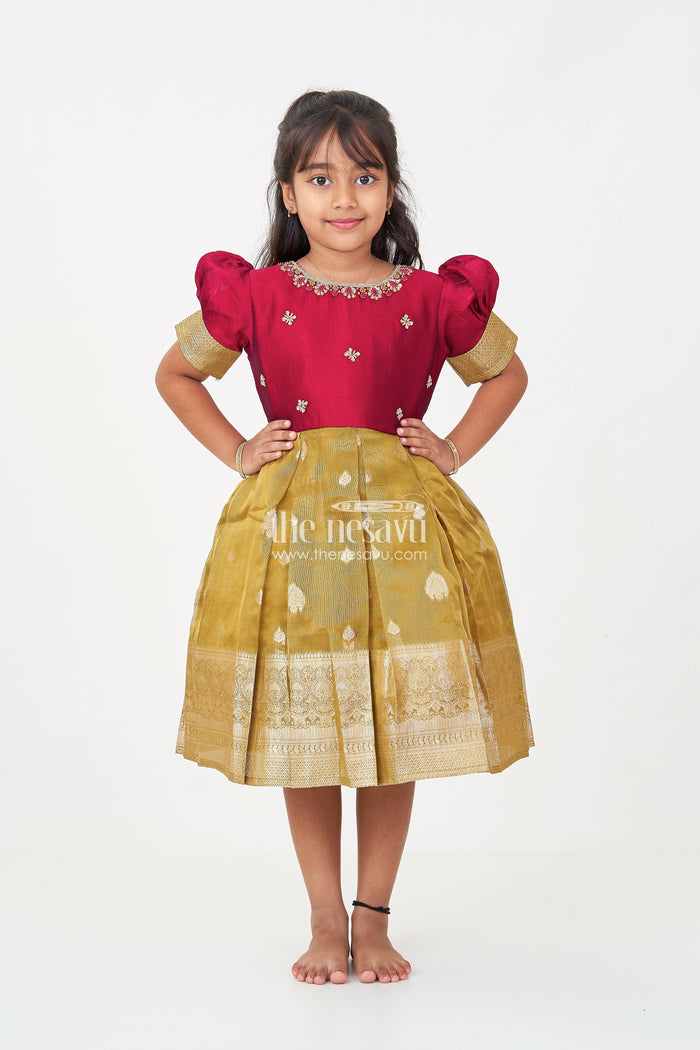 The Nesavu Silk Party Frock Silk Frocks for Girls with Maroon Embroidered Yoke and Gold Tissue Pleated Skirt for Festive Wear Nesavu Nesavu Silk Frocks for Girls with Maroon Embroidered Bodice and Gold Tissue Bottom for Festive Wear