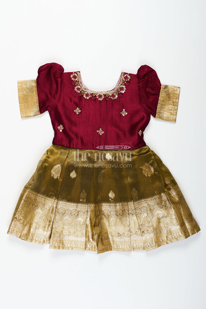 The Nesavu Silk Party Frock Silk Frocks for Girls with Maroon Embroidered Yoke and Gold Tissue Pleated Skirt for Festive Wear Nesavu Nesavu Silk Frocks for Girls with Maroon Embroidered Bodice and Gold Tissue Bottom for Festive Wear