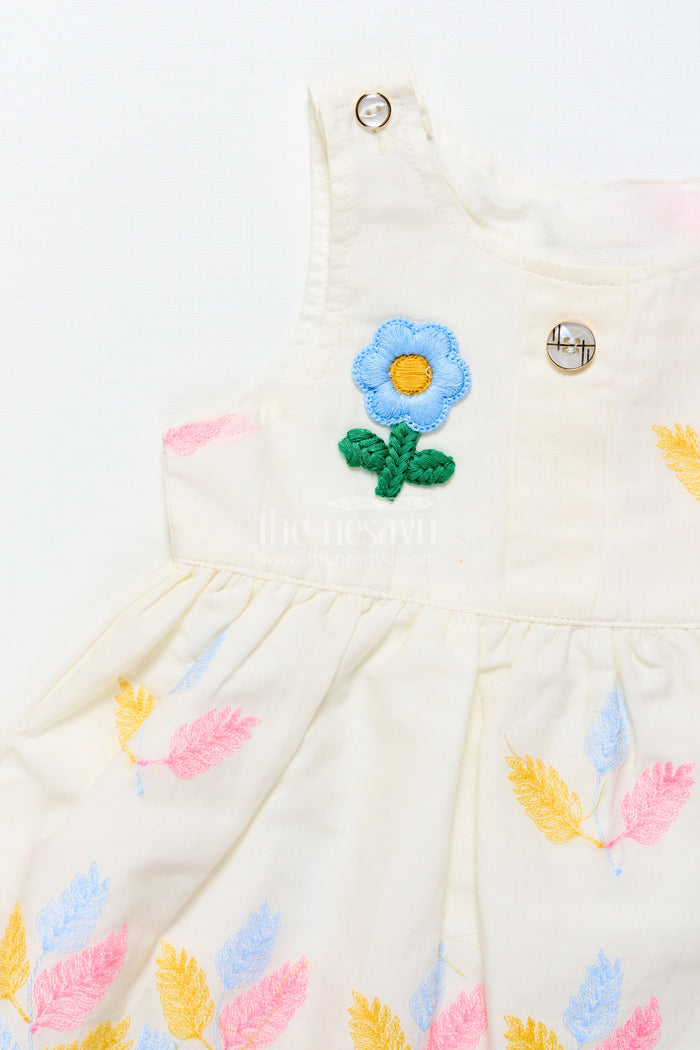 The Nesavu Baby Frocks Sleeveless Baby Frock with Floral Embroidery and Pastel Feather Design Nesavu Nesavu cream embroidered sleeveless baby frock with pastel leaf design