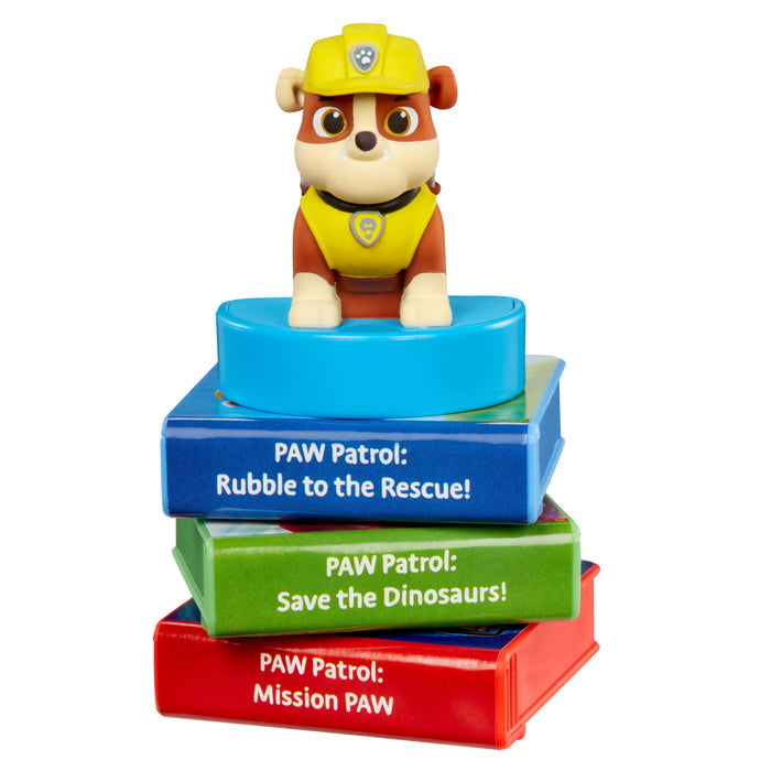 Rubble character sitting on three mini books on a white background