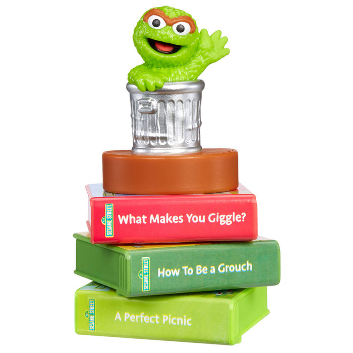 Oscar figure on stack of stories