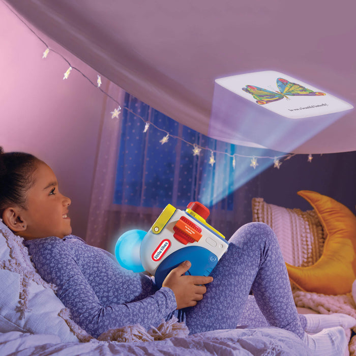 Girl watching story on the ceiling laying on the bed