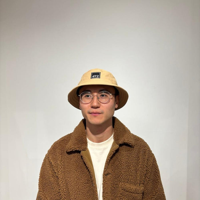 technical adjustable bucket hat, get lost, camel.