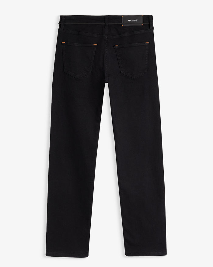The Jeans Classic Straight Fit in Jet Black — back view with black C'est normal patch