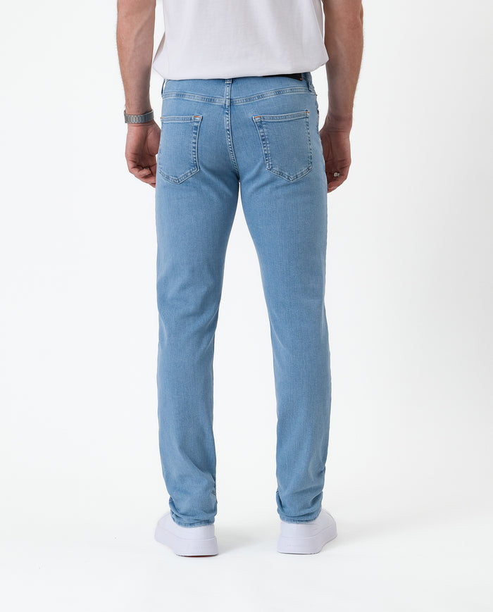 The Jeans Skinny Fit in Light Blue — back view against a white background