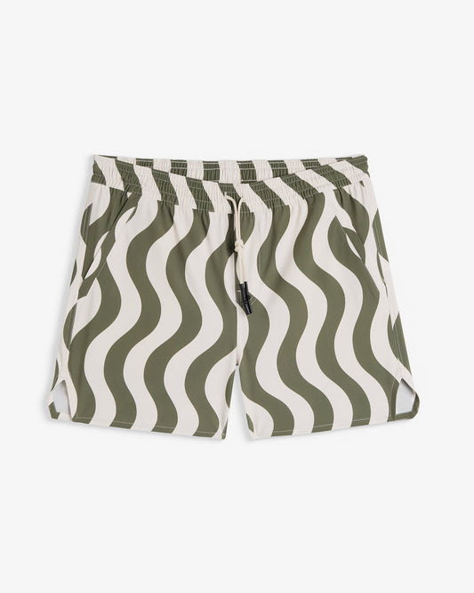 A front view of The Shorts in an olive curl stripe pattern, laid flat on a white background. The image highlights the wavy design, elasticated waistband with a drawstring, and notched hem.