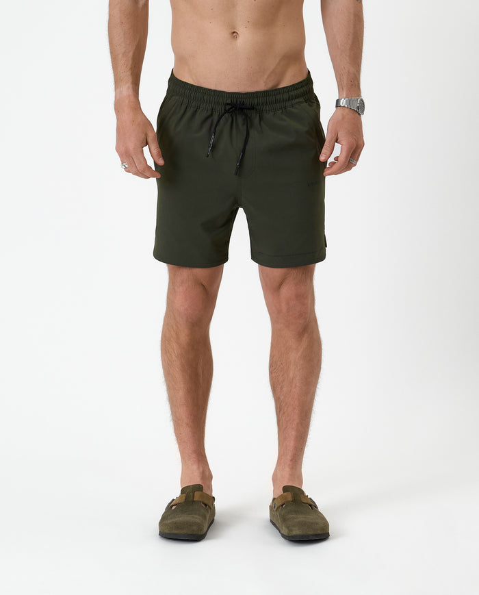 The Shorts in khaki — front view showing the drawstring and small C'est normal logo