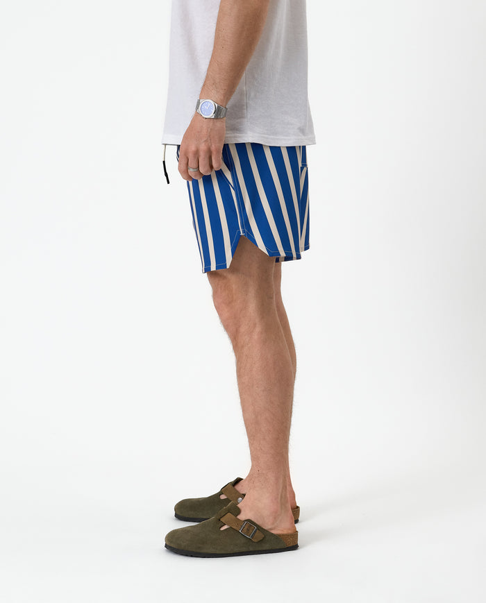 The Shorts in nautical stripe — side view showing the curved notched hem