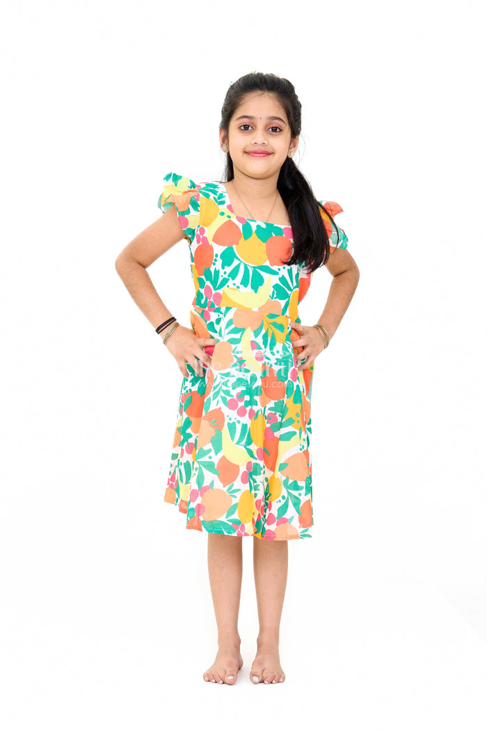The Nesavu Girls Cotton Frock Vibrant Girls Cotton Ki Gown with Bold Fruit Print and Flutter Sleeves Nesavu 16 (1Y) / Multicolor GFC1555A-16 Nesavu Girls Cotton Ki Gown Bright Fruit Print A-Line Design Flutter Sleeves