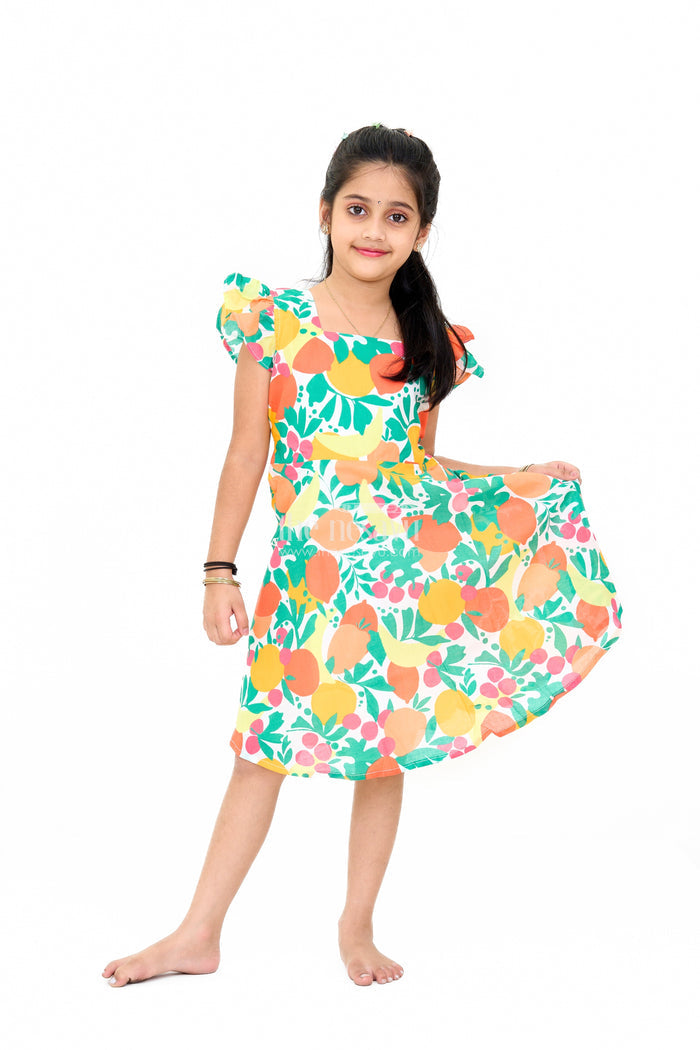 The Nesavu Girls Cotton Frock Vibrant Girls Cotton Ki Gown with Bold Fruit Print and Flutter Sleeves Nesavu Nesavu Girls Cotton Ki Gown Bright Fruit Print A-Line Design Flutter Sleeves
