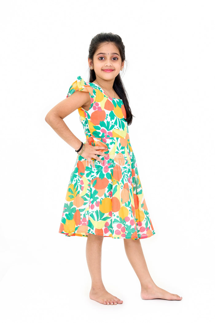 The Nesavu Girls Cotton Frock Vibrant Girls Cotton Ki Gown with Bold Fruit Print and Flutter Sleeves Nesavu Nesavu Girls Cotton Ki Gown Bright Fruit Print A-Line Design Flutter Sleeves