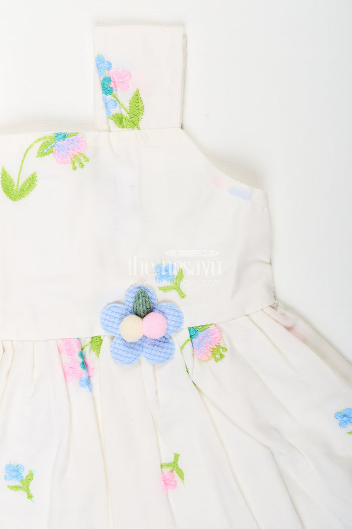 The Nesavu Baby Cotton Frocks White cotton frock with floral embroidery and shoulder straps for baby girls Nesavu Nesavu white cotton frock for baby girls with shoulder straps and colorful floral embroidery