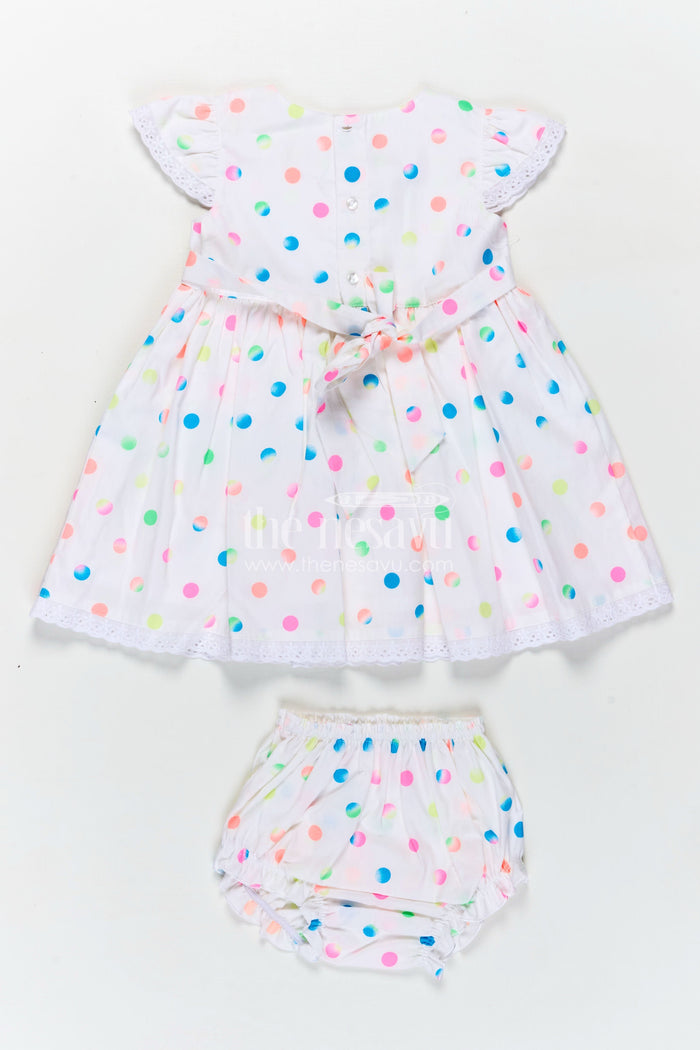 The Nesavu Baby Cotton Frocks White Newborn Clothes in Cotton with Neon Polka Dot Print and Frilly Sleeves for Baby Girls Nesavu Nesavu White Cotton Newborn Clothes Neon Polka Dots Lace Trimmed Sleeves Baby Girls