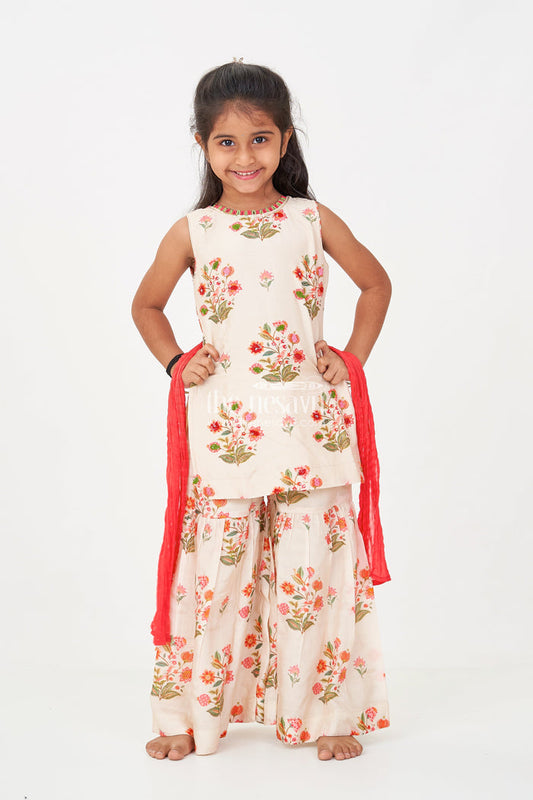 The Nesavu Girls Sharara / Plazo Set White Palazzo Suit for Girls in Floral Digital Print Viscose Silk with Flared Bottoms and Dupatta Nesavu 16 (1Y) / Cream GPS590A-16 Nesavu White Palazzo Suit for Girls with Floral Digital Print in Viscose Silk and Matching Dupatta