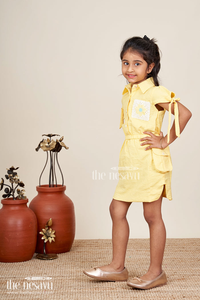 The Nesavu Girls Cotton Frock Yellow collared cotton frock with crochet detail for girls Nesavu Nesavu girls yellow cotton frock with collar and crochet pocket for casual summer wear