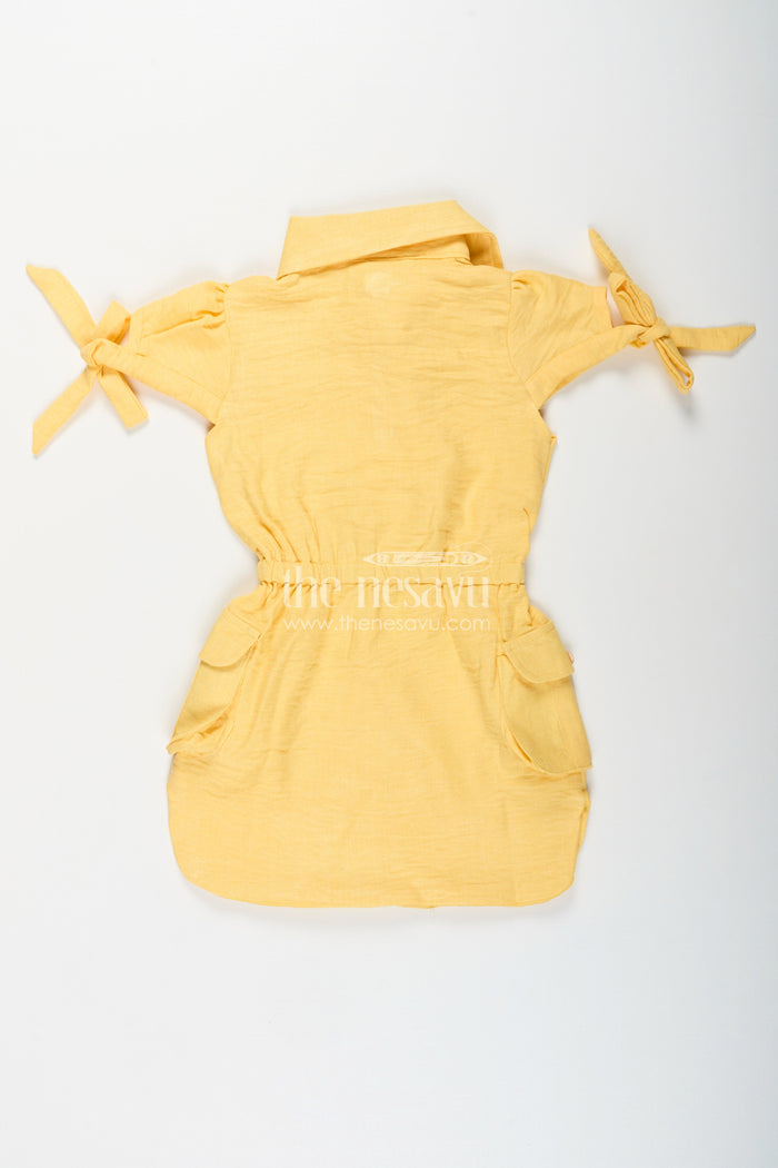 The Nesavu Girls Cotton Frock Yellow collared cotton frock with crochet detail for girls Nesavu Nesavu girls yellow cotton frock with collar and crochet pocket for casual summer wear